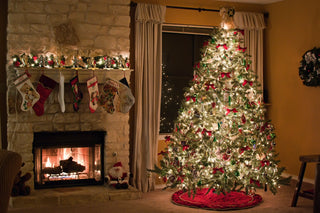 Cozy living room with Christmas tree and fireplace — warm holiday décor and ambient lighting