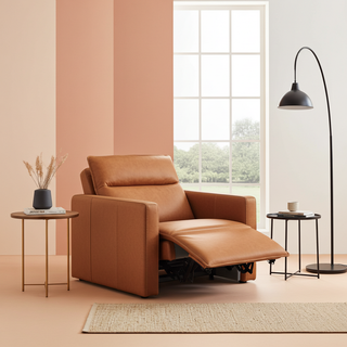 Moorizon Bold Leather collection chair in Brown — modern lounge chair with rounded arms, arched window backdrop