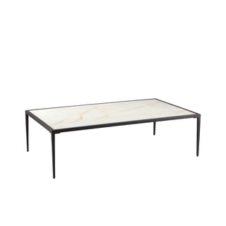 angle view of large modern rectangular calcite coffee table with slim black metal legs