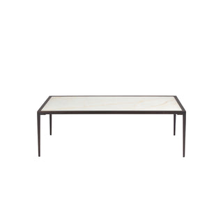 front view of small rectangular calcite coffee table with slim black metal frame