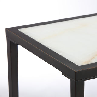 close up of calcite table top and black frame detail on modern console table