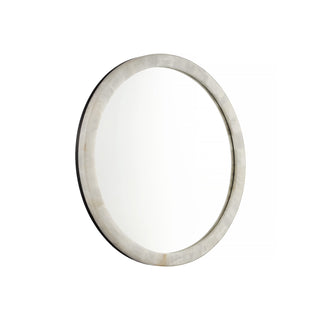 angle view of round LED backlit mirror with natural calcite stone frame