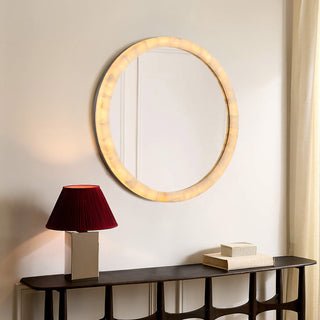 living room view of calista LED backlet mirror with golden natural calcite stone frame