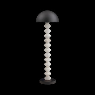 Calista sculptural floor lamp front view on black background, stacked column and dome shade, light off