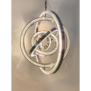 Side angle of Celestial Orbit chandelier hanging from stem, sculptural modern ring chandelier for foyer