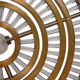 Curved ring detail of Celestial Orbit chandelier, warm brass finish modern LED chandelier texture
