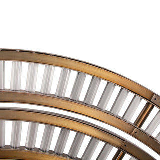 Detail of Celestial Orbit chandelier brass rail, curved modern ring chandelier close up on white background