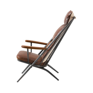side view of light brown leather lounge chair with metal frame and wood armrests