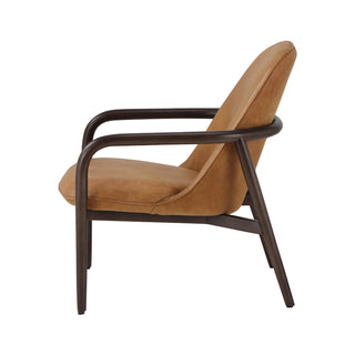 side view of cognac leather armchair with minimal curved wood frame