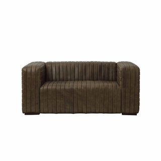 front view of 2-seater ribbed leather sofa in warm whiskey color, studio lighting