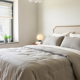 moonlit table lamp placed on a wooden nighstand styled in modern bedroom interior