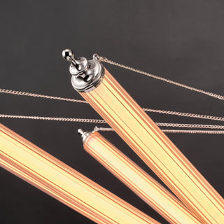 Illuminated ribbed glass tube arm with a polished nickel end cap and chain adjustment detail on the Moorizon Aurora chandelier.