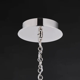 Polished nickel ceiling canopy and hanging chain of the Moorizon Aurora Sputnik chandelier against a black background.