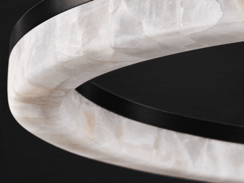 Underside view of the Calista chandelier: calcite wraps the outside and bottom of the ring. Dimmable calcite ring light fixture