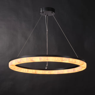 Calista Ring Calcite Stone Chandelier illuminated with a continuous warm glow within a matte black metal frame.