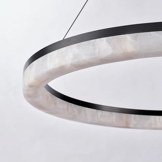 Unlit calcite detail on the Calista chandelier showing pale color and natural veining against a white background.