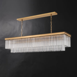 Three-quarter view of the unlit Marais 60-inch rectangular glass chandelier on a black background, showing the tiered clear glass rods, rectangular brass-finished frame, and chain suspension.
