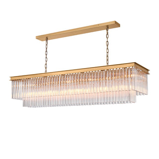 Three-quarter view of the illuminated Marais 60-inch rectangular glass chandelier on a white background, featuring layered clear glass rods, a warm brass finish, and linear lighting for kitchen islands or dining rooms.