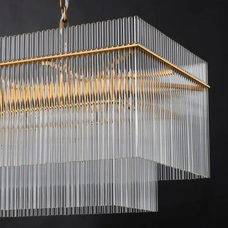 Unlit corner of the Timelore chandelier, the inner frame showing through the clear rods of both tiers