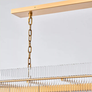 Chain with a safety cable threaded through its links, hanging from the long canopy of the Timelore chandelier