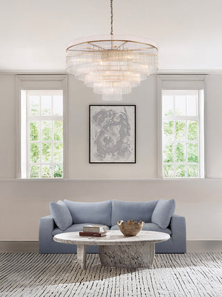 Moorizon Balance Collection blue fabric sofa with glass rod chandelier, modern living room