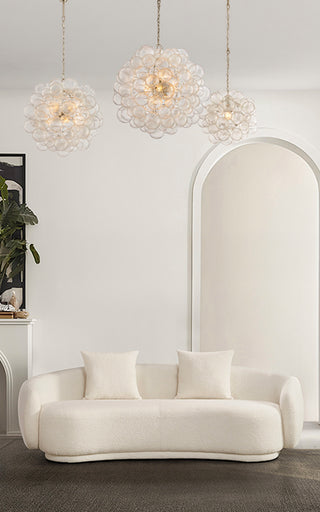 Moorizon Lovenest white boucle curved sofa, elegant modern living room design