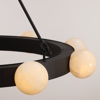 Close-up of Moorizon Luna Orbit 36 inch black ring chandelier globe detail