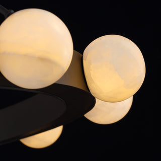 Moorizon Luna Orbit 60 inch large chandelier close up, oversized ring with warm glowing glass orbs