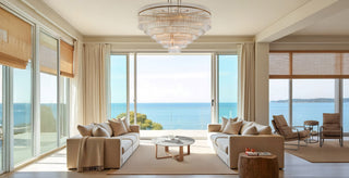 Modern minimalist living space with handcrafted furniture and sculptural chandelier by Moorizon