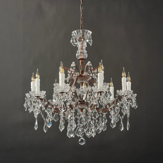 Unlit Moorizon Rustline 12-light crystal chandelier full view with ornate iron frame and cascading crystal accents on a black background