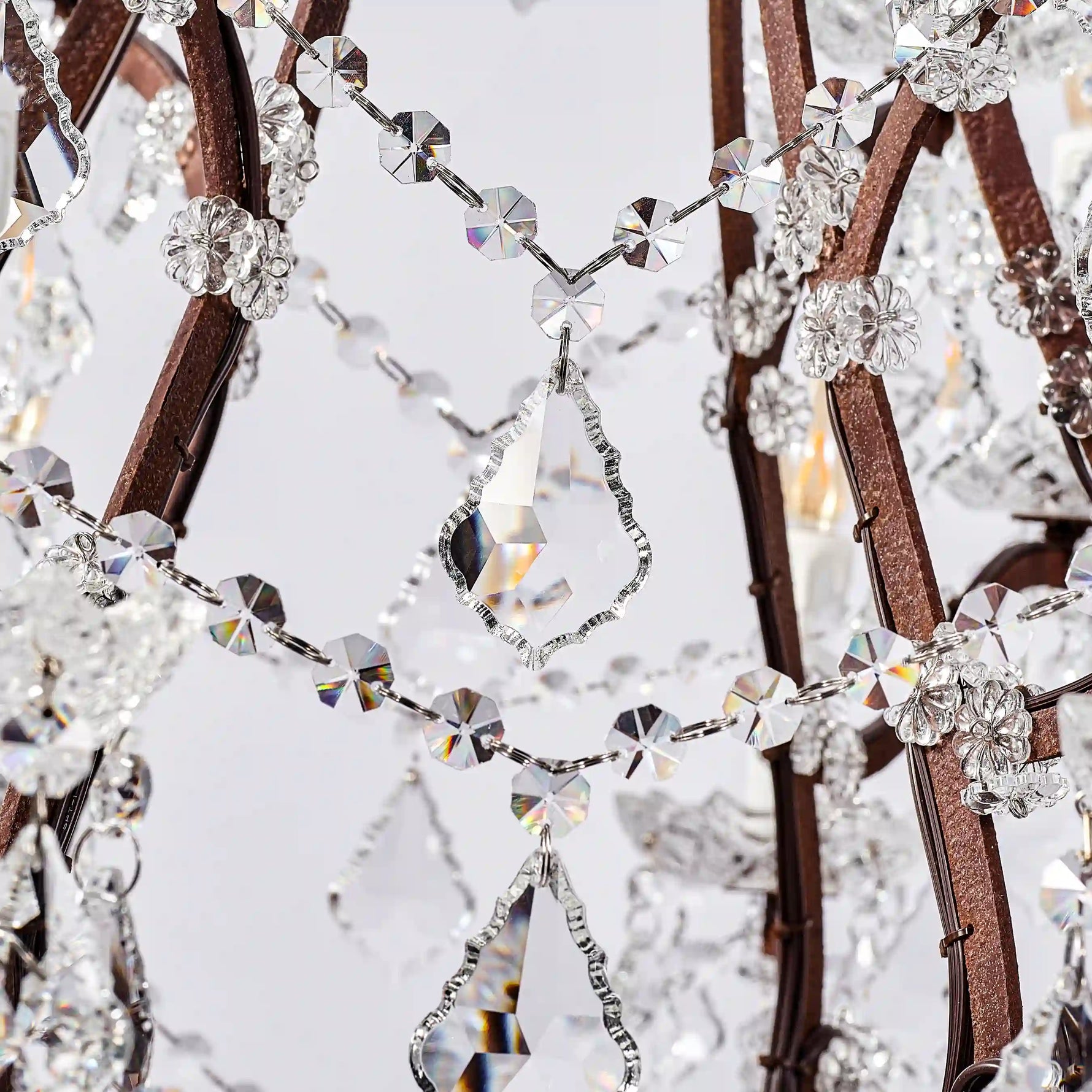 Moorizon Rustline 25-light crystal chandelier close-up showing faceted K9 crystals and decorative metal chain details, white background detail view