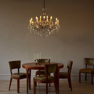 Rustline crystal chandelier with weathered iron frame over dining table, Moorizon