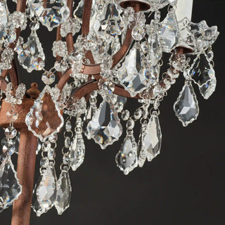 Close-up of layered crystal drops on Rustline crystal floor lamp in a black background. 