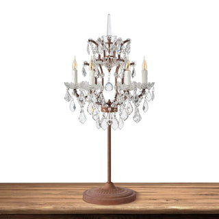 Unlit Moorizon Rustline crystal table lamp with chandelier-style crystal accents, candle sleeves, and a round base on a white background