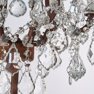 Unlit Moorizon Rustline crystal table lamp detail showing faceted crystal drops, decorative chains, and antique-style metal accents on a white background