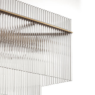 Timelore Rectangular Chandelier detail on a white background, showing individual clear glass rods beneath a warm brass frame.
