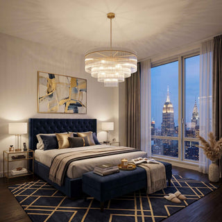 Timelore small round chandelier with tiered glass rods in a modern bedroom skyline view.