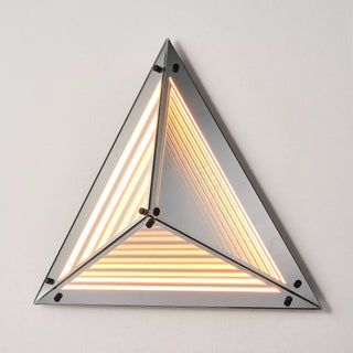 Warmly lit Moorizon Trigon LED infinity glass mirror in an upright triangular design with layered amber LED lines and reflective glass details