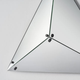 Unlit Moorizon Trigon LED infinity glass mirror detail showing reflective triangular glass panels, center hardware, and clean metal trim