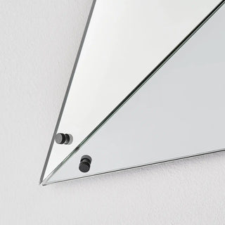 Unlit Moorizon Trigon LED infinity glass mirror detail showing triangular reflective glass panels, slim metal edges, and corner hardware on a white background