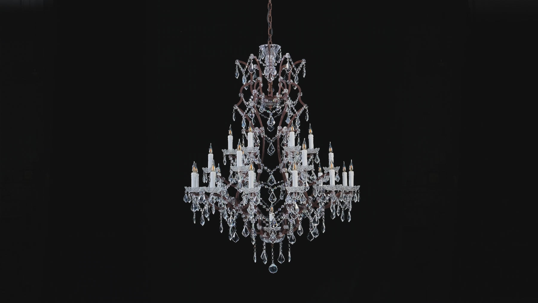 Rustline 18-Light Crystal Chandelier shown lit and unlit in full and close-up views, highlighting candle-style lights and cascading faceted crystals.