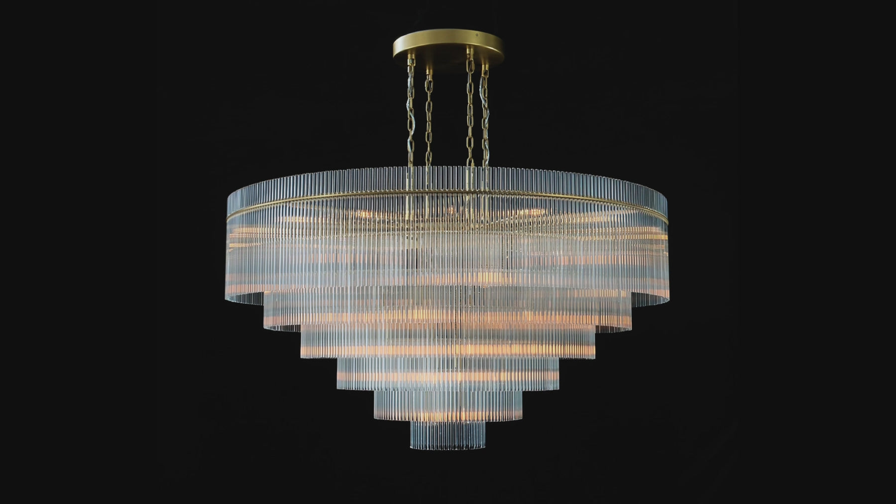Timelore Round Glass Rod Chandelier shown illuminated and unlit from full and close-up angles, highlighting tiered clear glass rods and its brass-finished frame.