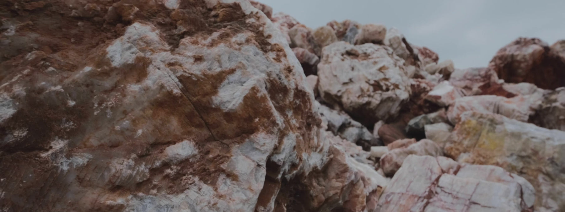 Calista Ring Calcite Stone Chandelier process video showing natural calcite cut, shaped, hollowed, polished, inspected, and illuminated to reveal its warm translucency.