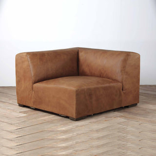 front view of Rustic Haven corner sectional sofa piece in cocoa brown leather, wood floor background