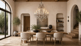 Rustline crystal chandelier with candle-style lights and cascading K9 crystals above a refined dining table.