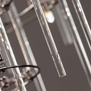 detail shot of Stardust chandelier’s handcrafted glass tubes with polished connector accents