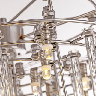 close-up of layered glass rod structure on stardust table lamp with polished metal frame