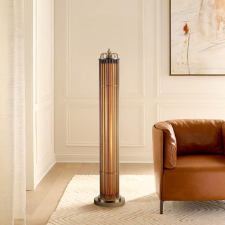  Urban Glow floor lamp standing tall in a minimalist interior with arched doorway and natural lighting, creating a refined decorative accent