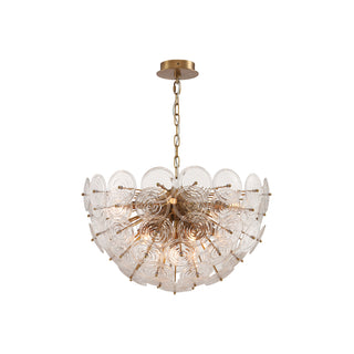Wavora Demi semi-round crystal chandelier on white background, cascading glass petals and warm brass frame