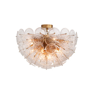 Wavora demi flushmount ceiling light cutout on white background, round glass petal fixture with brass base